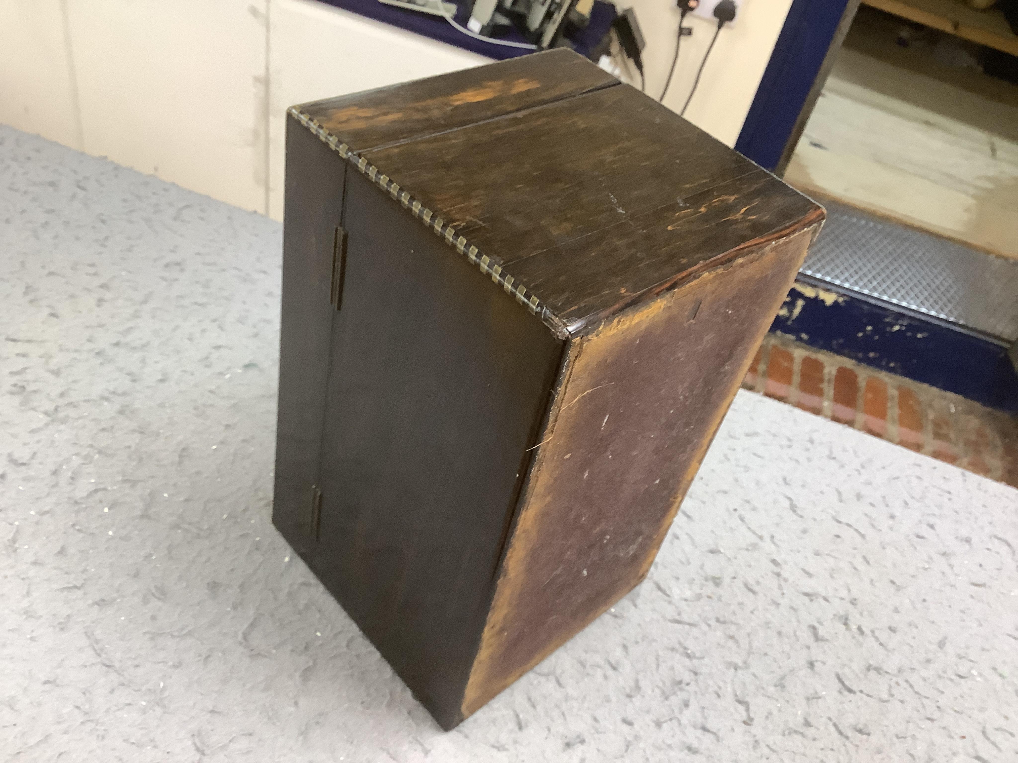 An early 19th century brass inlaid coromandel tea caddy with birch lining, 25cm wide. Condition - fair